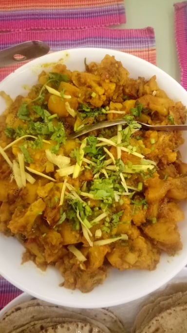 Tasty Adraki Gobhi cooked by COOX chefs cooks during occasions parties events at home