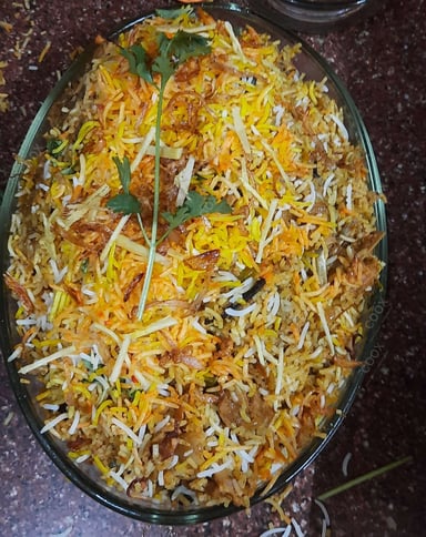 Tasty Mutton Biryani cooked by COOX chefs cooks during occasions parties events at home