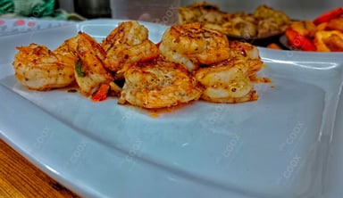 Tasty Butter Garlic Prawns cooked by COOX chefs cooks during occasions parties events at home