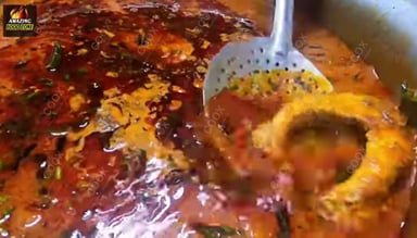 Tasty Kerala Fish Curry cooked by COOX chefs cooks during occasions parties events at home