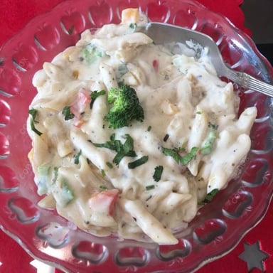 Tasty Pasta in White Sauce cooked by COOX chefs cooks during occasions parties events at home