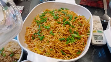Tasty Chilli Garlic Noodles cooked by COOX chefs cooks during occasions parties events at home