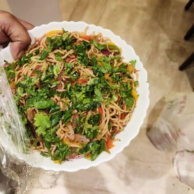 Tasty Veg Hakka Noodles cooked by COOX chefs cooks during occasions parties events at home