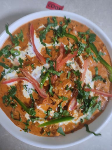 Tasty Chicken Tikka Masala cooked by COOX chefs cooks during occasions parties events at home