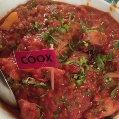 Tasty Kadhai Chicken cooked by COOX chefs cooks during occasions parties events at home
