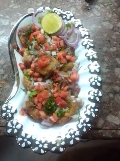 Tasty Aloo Tikki Chaat cooked by COOX chefs cooks during occasions parties events at home