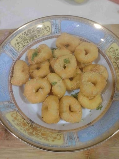 Tasty Medu Vada cooked by COOX chefs cooks during occasions parties events at home
