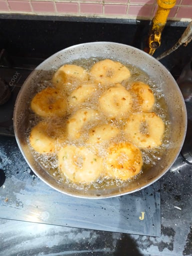 Tasty Vada Sambhar cooked by COOX chefs cooks during occasions parties events at home