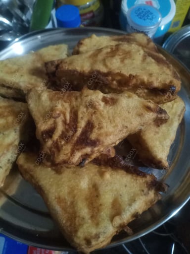 Tasty Bread Pakode cooked by COOX chefs cooks during occasions parties events at home