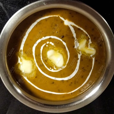 Tasty Dal Makhni cooked by COOX chefs cooks during occasions parties events at home