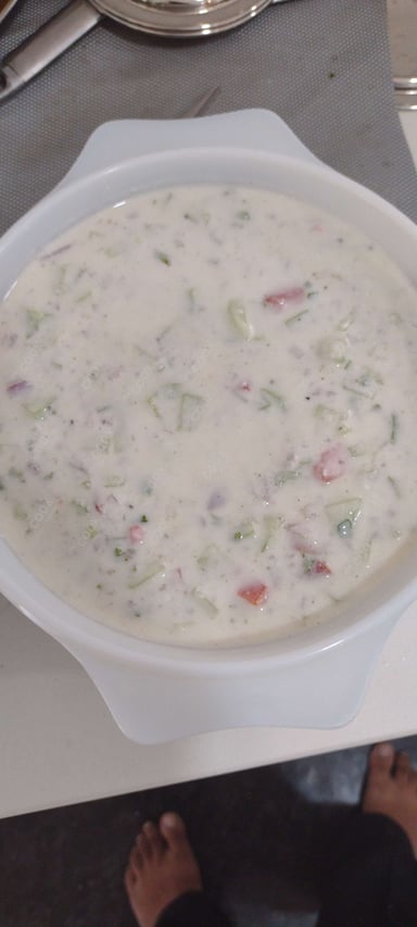 Tasty Mix Veg Raita cooked by COOX chefs cooks during occasions parties events at home