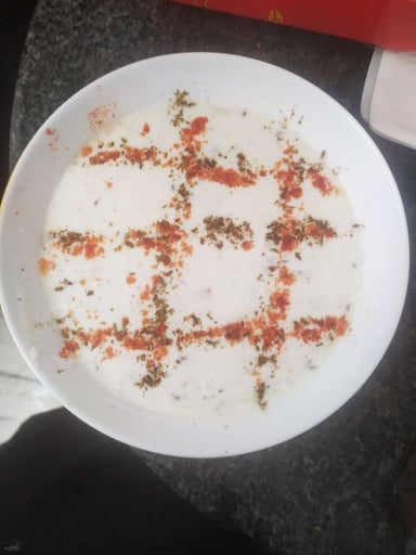 Tasty Mix Veg Raita cooked by COOX chefs cooks during occasions parties events at home