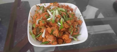 Tasty Chicken 65 cooked by COOX chefs cooks during occasions parties events at home