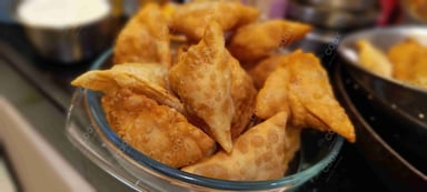 Tasty Keema Samosas cooked by COOX chefs cooks during occasions parties events at home