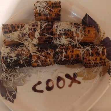 Tasty Grilled Corn cooked by COOX chefs cooks during occasions parties events at home