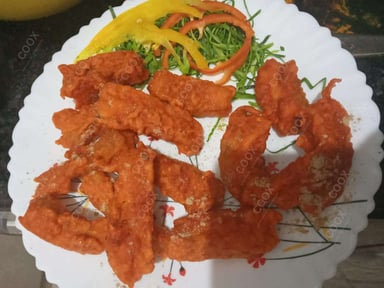 Tasty Amritsari Fish Fry cooked by COOX chefs cooks during occasions parties events at home