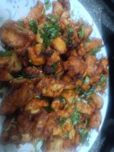 Tasty Chicken 65 cooked by COOX chefs cooks during occasions parties events at home