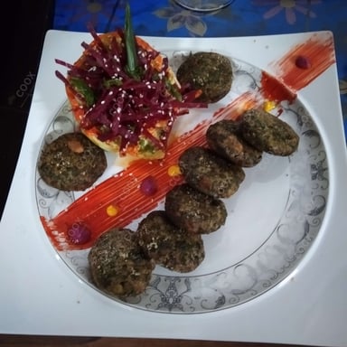 Tasty Hariyali Kebab cooked by COOX chefs cooks during occasions parties events at home