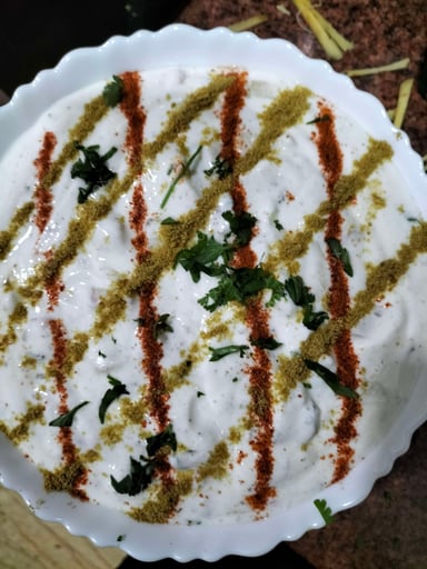 Tasty Mix Veg Raita cooked by COOX chefs cooks during occasions parties events at home