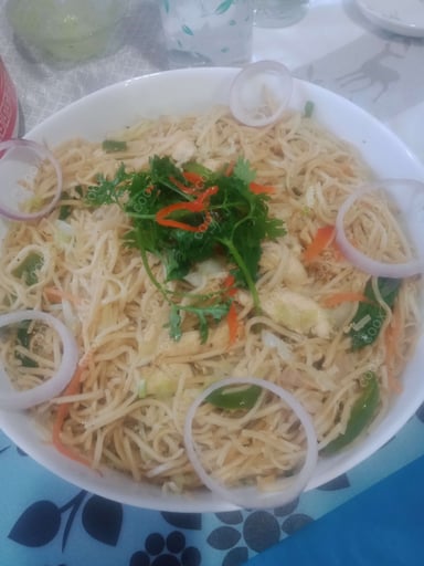 Tasty Chicken Hakka Noodles cooked by COOX chefs cooks during occasions parties events at home
