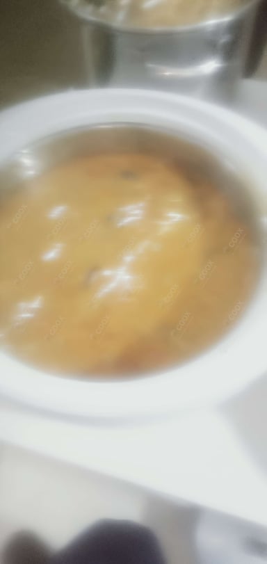 Tasty Sambhar cooked by COOX chefs cooks during occasions parties events at home