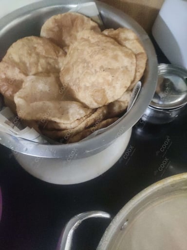 Tasty Kuttu ki Pooris cooked by COOX chefs cooks during occasions parties events at home