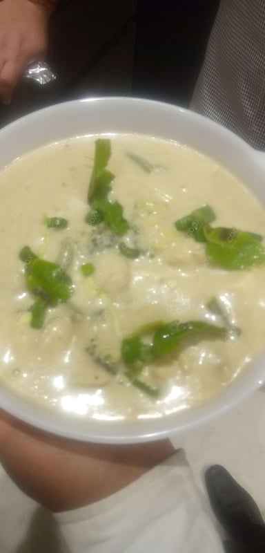 Tasty Green Thai Curry cooked by COOX chefs cooks during occasions parties events at home