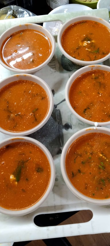 Tasty Tomato Basil Soup cooked by COOX chefs cooks during occasions parties events at home