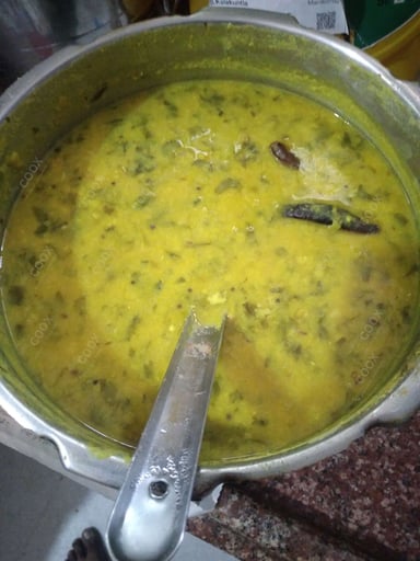 Tasty Palak Dal cooked by COOX chefs cooks during occasions parties events at home