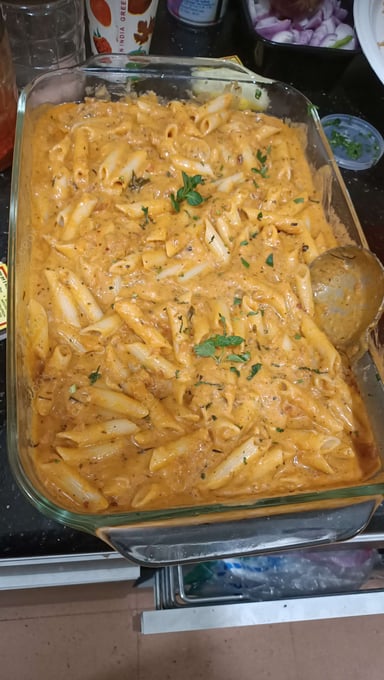 Tasty Pasta in Pink Sauce cooked by COOX chefs cooks during occasions parties events at home
