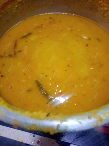 Tasty Palak Dal cooked by COOX chefs cooks during occasions parties events at home