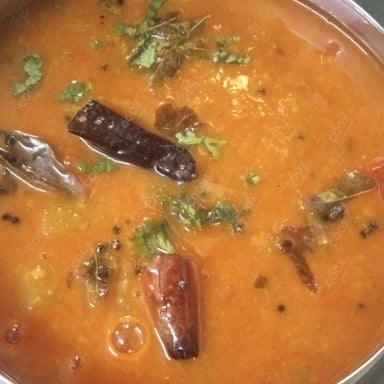 Tasty Sambhar cooked by COOX chefs cooks during occasions parties events at home