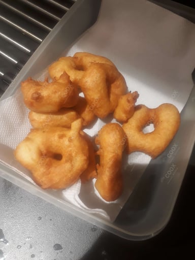 Tasty Medu Vada cooked by COOX chefs cooks during occasions parties events at home