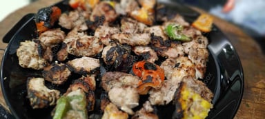 Tasty Murgh Malai Tikka cooked by COOX chefs cooks during occasions parties events at home