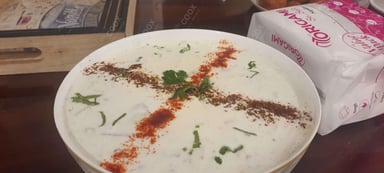 Tasty Mix Veg Raita cooked by COOX chefs cooks during occasions parties events at home