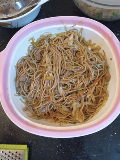 Tasty Chicken Hakka Noodles cooked by COOX chefs cooks during occasions parties events at home