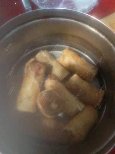 Tasty Chicken Spring Rolls cooked by COOX chefs cooks during occasions parties events at home