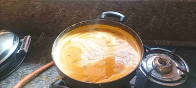 Tasty Sambhar cooked by COOX chefs cooks during occasions parties events at home