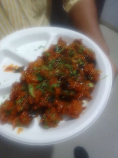 Tasty Chicken 65 cooked by COOX chefs cooks during occasions parties events at home
