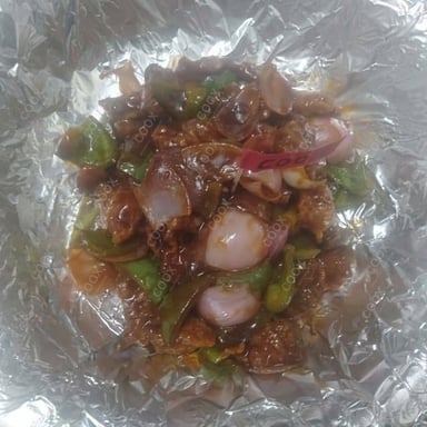Tasty Veg Manchurian (Dry) cooked by COOX chefs cooks during occasions parties events at home