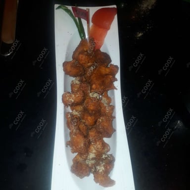 Tasty Amritsari Fish Fry cooked by COOX chefs cooks during occasions parties events at home