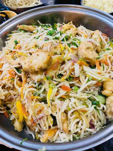 Tasty Chicken Hakka Noodles cooked by COOX chefs cooks during occasions parties events at home