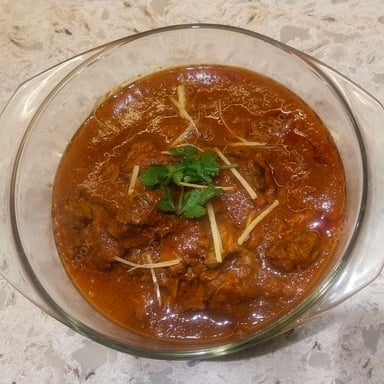 Tasty Mutton Rogan Josh cooked by COOX chefs cooks during occasions parties events at home