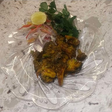 Tasty Masala Broccoli cooked by COOX chefs cooks during occasions parties events at home
