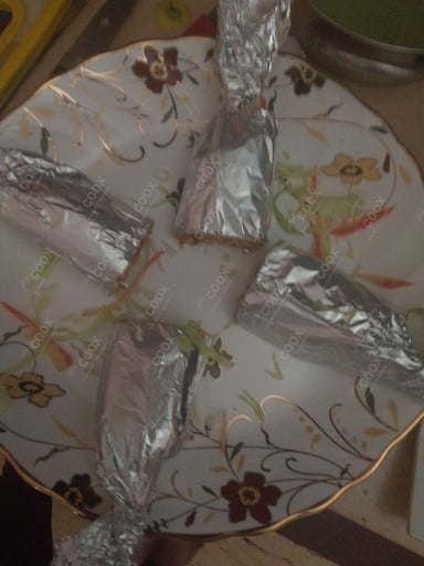 Tasty Chicken Kathi Rolls cooked by COOX chefs cooks during occasions parties events at home