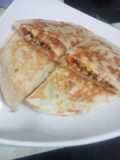Tasty Chicken Quesadillas cooked by COOX chefs cooks during occasions parties events at home