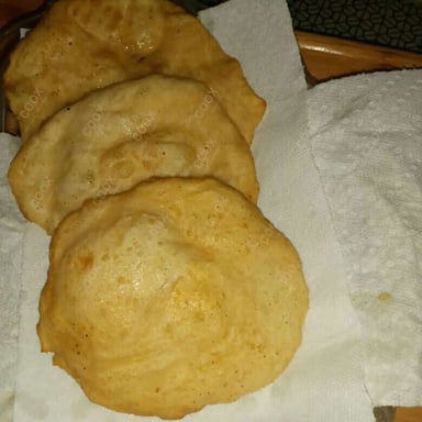 Tasty Bhature cooked by COOX chefs cooks during occasions parties events at home