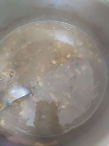 Tasty Chicken Manchow Soup cooked by COOX chefs cooks during occasions parties events at home