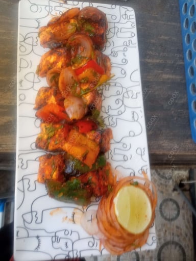 Tasty Paneer Tikka cooked by COOX chefs cooks during occasions parties events at home