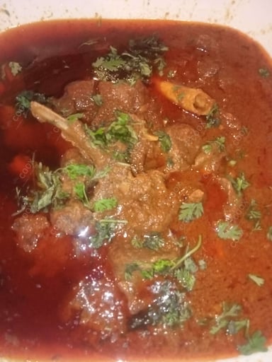 Tasty Mutton Korma cooked by COOX chefs cooks during occasions parties events at home
